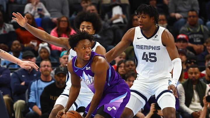Jan 25, 2025; Memphis, Tennessee, USA; Utah Jazz guard Collin Sexton (2) handles the ball against Memphis Grizzlies forward Jaylen Wells (0) and forward GG Jackson II (45) during the second quarter at FedExForum. Mandatory Credit: Petre Thomas-Imagn Images