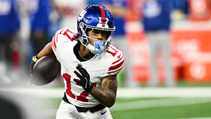 Nov 23, 2025; Detroit, Michigan, USA; New York Giants wide receiver Wan'Dale Robinson (17) runs upfield after catching a swing pass in the second quarter against the Detroit Lions at Ford Field. Nov 23, 2025; Detroit, Michigan, USA; New York Giants wide receiver Wan'Dale Robinson (17) runs upfield after catching a swing pass in the second quarter against the Detroit Lions at Ford Field.