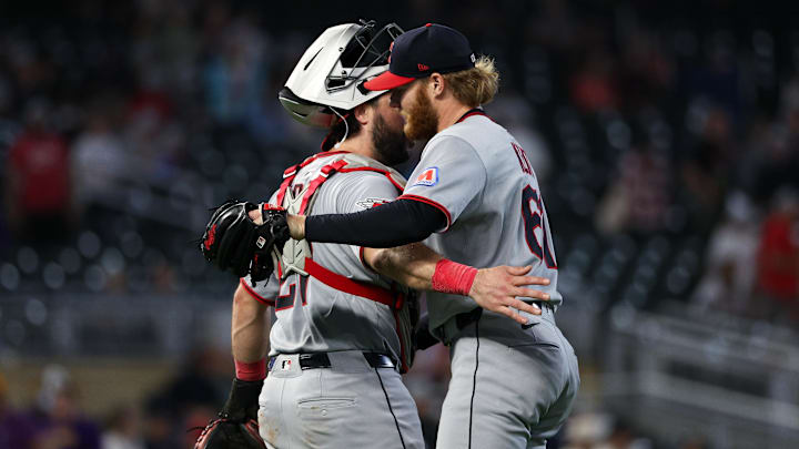 Sep 20, 2025; Minneapolis, Minnesota, USA; Cleveland Guardians catcher Austin Hedges (27) and pitcher Zak Kent (61) celebrate their teams win against the Minnesota Twins after game two of a double header at Target Field. Mandatory Credit: Matt Krohn-Imagn Images