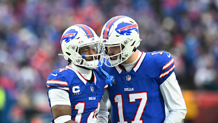 Dec 31, 2023; Orchard Park, New York, USA; Buffalo Bills quarterback Josh Allen (17) has a word with wide receiver Stefon Diggs (14) between plays in the third quarter game against the New England Patriots at Highmark Stadium.