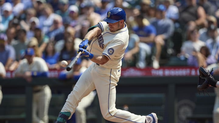 Seattle Mariners first baseman Luke Raley hits a three-run home run against the Houston Astros on Sunday at T-Mobile Park. Seattle Mariners first baseman Luke Raley hits a three-run home run against the Houston Astros on Sunday at T-Mobile Park.