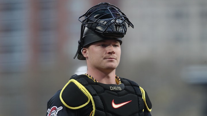 Apr 14, 2025; Pittsburgh, Pennsylvania, USA;  Pittsburgh Pirates catcher Henry Davis (32) behind the plate against the Washington Nationals during the first inning at PNC Park. Mandatory Credit: Charles LeClaire-Imagn Images