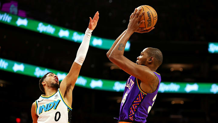 Dec 19, 2024; Phoenix, Arizona, USA; Phoenix Suns forward Kevin Durant (35) shoots the ball against Indiana Pacers guard Tyrese Haliburton (0) during the third quarter at Footprint Center. Mandatory Credit: Mark J. Rebilas-Imagn Images Dec 19, 2024; Phoenix, Arizona, USA; Phoenix Suns forward Kevin Durant (35) shoots the ball against Indiana Pacers guard Tyrese Haliburton (0) during the third quarter at Footprint Center. Mandatory Credit: Mark J. Rebilas-Imagn Images