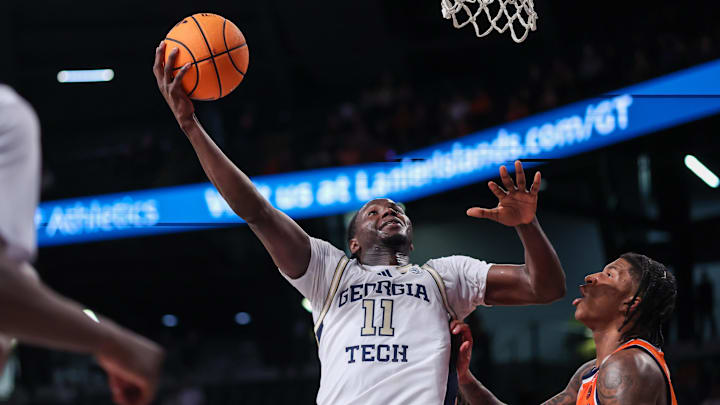 Jan 6, 2026; Atlanta, Georgia, USA; Georgia Tech Yellow Jackets forward Baye Ndongo (11) shoots against the Syracuse Orange in the second half at McCamish Pavilion. Mandatory Credit: Brett Davis-Imagn Images

