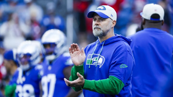 Oct 10, 2024; Seattle, Washington, USA; Seattle Seahawks offensive coordinator Ryan Grubb watches pregame warmups against the San Francisco 49ers at Lumen Field. Mandatory Credit: Joe Nicholson-Imagn Images