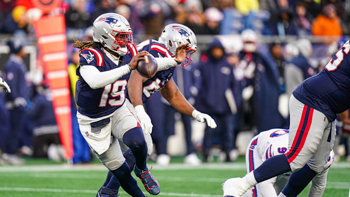 Jan 5, 2025; Foxborough, Massachusetts, USA; New England Patriots quarterback Joe Milton III (19) looks to pass the ball against the Buffalo Bills in the second half at Gillette Stadium. Mandatory Credit: David Butler II-Imagn Images