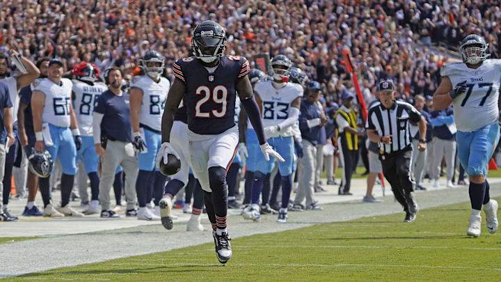 Sep 8, 2024; Chicago, Illinois, USA; Chicago Bears cornerback Tyrique Stevenson (29) intercepts a pass against the Tennessee Titans for a touchdown during the second half at Soldier Field. Mandatory Credit: David Banks-Imagn Images