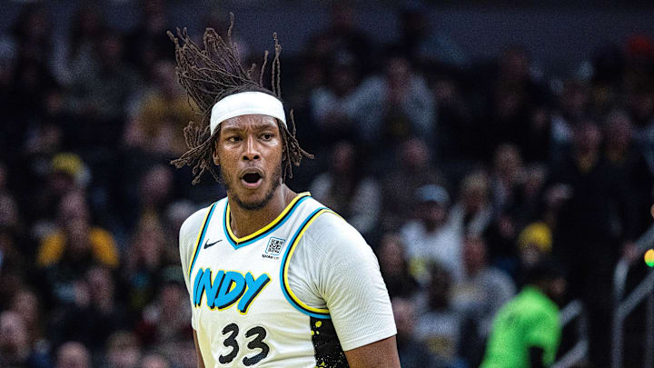 Feb 20, 2025; Indianapolis, Indiana, USA; Indiana Pacers center Myles Turner (33) celebrates a made basket in the first half against the Memphis Grizzlies at Gainbridge Fieldhouse. Mandatory Credit: Trevor Ruszkowski-Imagn Images Feb 20, 2025; Indianapolis, Indiana, USA; Indiana Pacers center Myles Turner (33) celebrates a made basket in the first half against the Memphis Grizzlies at Gainbridge Fieldhouse. Mandatory Credit: Trevor Ruszkowski-Imagn Images