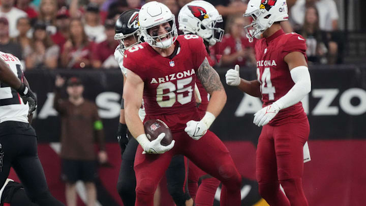 Arizona Cardinals tight end Trey McBride celebrates his first down catch