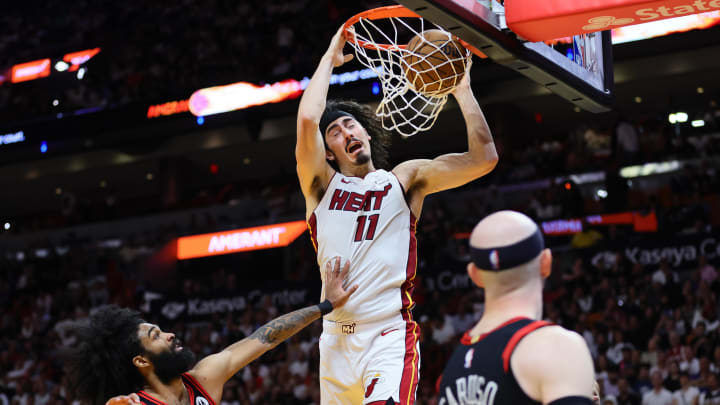 Apr 19, 2024; Miami, Florida, USA; Miami Heat guard Jaime Jaquez Jr. (11) dunks the basketball against the Chicago Bulls in the fourth quarter during a play-in game of the 2024 NBA playoffs at Kaseya Center. Mandatory Credit: Sam Navarro-USA TODAY Sports