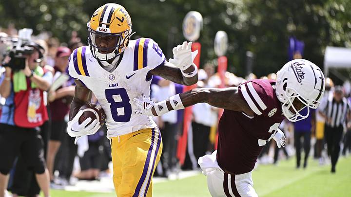 Sep 16, 2023; Starkville, Mississippi, USA; LSU Tigers wide receiver Malik Nabers (8) makes a reception while defended by Mississippi State Bulldogs cornerback Decamerion Richardson (3) on a play that would result in a touchdown during the fourth quarter at Davis Wade Stadium at Scott Field. Mandatory Credit: Matt Bush-Imagn Images Sep 16, 2023; Starkville, Mississippi, USA; LSU Tigers wide receiver Malik Nabers (8) makes a reception while defended by Mississippi State Bulldogs cornerback Decamerion Richardson (3) on a play that would result in a touchdown during the fourth quarter at Davis Wade Stadium at Scott Field. Mandatory Credit: Matt Bush-Imagn Images