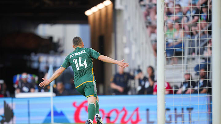 May 18, 2024; Saint Paul, Minnesota, USA; Portland Timbers forward Jonathan Rodriguez (14) celebrates after scoring a goal during the first half against Minnesota United at Allianz Field. Mandatory Credit: Brad Rempel-USA TODAY Sports