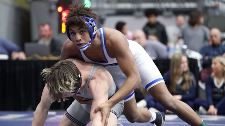 Stillwater's LaDarion Lockett, top, wrestles Edmond North's Brayden Lucas in the Class 6A 157-pound match during the dual state wrestling tournament finals at Stride Bank Center in Enid, Okla., Saturday, Feb. 11, 2023.

Dual State Wrestling Tournament Finals