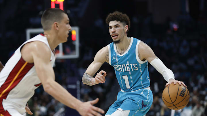 Oct 26, 2024; Charlotte, North Carolina, USA; Charlotte Hornets guard LaMelo Ball (1) moves the basketball against the Miami Heat during the second half at Spectrum Center. Mandatory Credit: Nell Redmond-Imagn Images