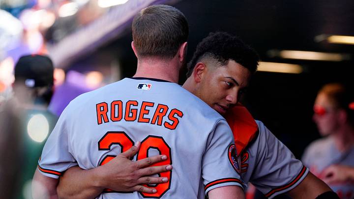 Sep 2, 2026; Denver, Colorado, USA; Baltimore Orioles catcher Samuel Basallo (29) hugs starting pitcher Trevor Rogers (28) after the seventh inning against the Colorado Rockies at Coors Field. Mandatory Credit: Ron Chenoy-Imagn Images Sep 2, 2026; Denver, Colorado, USA; Baltimore Orioles catcher Samuel Basallo (29) hugs starting pitcher Trevor Rogers (28) after the seventh inning against the Colorado Rockies at Coors Field. Mandatory Credit: Ron Chenoy-Imagn Images