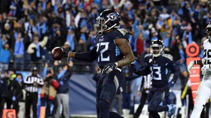 Dec 6, 2018; Nashville, TN, USA; Tennessee Titans running back Derrick Henry (22) carries the ball on a 16-yard touchdown run in the third quarter against the Jacksonville Jaguars at Nissan Stadium. The Titans defeated the Jaguars 30-9. Mandatory Credit: Kirby Lee-USA TODAY Sports Dec 6, 2018; Nashville, TN, USA; Tennessee Titans running back Derrick Henry (22) carries the ball on a 16-yard touchdown run in the third quarter against the Jacksonville Jaguars at Nissan Stadium. The Titans defeated the Jaguars 30-9. Mandatory Credit: Kirby Lee-USA TODAY Sports