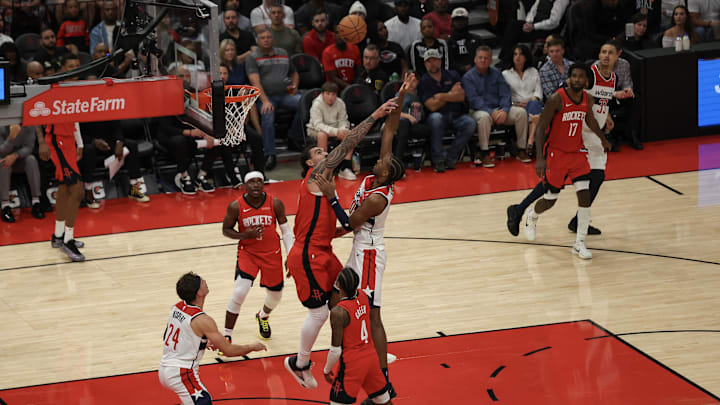 Nov 11, 2024; Houston, Texas, USA; Washington Wizards guard Bilal Coulibaly (0) shoots against Houston Rockets center Steven Adams (12) in the second half at Toyota Center. Mandatory Credit: Thomas Shea-Imagn Images Nov 11, 2024; Houston, Texas, USA; Washington Wizards guard Bilal Coulibaly (0) shoots against Houston Rockets center Steven Adams (12) in the second half at Toyota Center. Mandatory Credit: Thomas Shea-Imagn Images