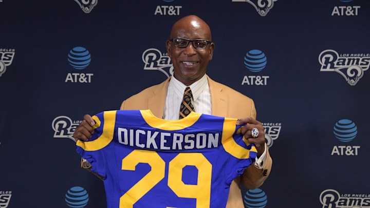 Aug 29, 2017; Thousand Oaks, CA, USA; Los Angeles Rams former running back Eric Dickerson poses with No. 29 jersey during a press conference after signing a one-day contract to retire as a member of the Rams at Cal Lutheran University.  Mandatory Credit: Kirby Lee-Imagn Images