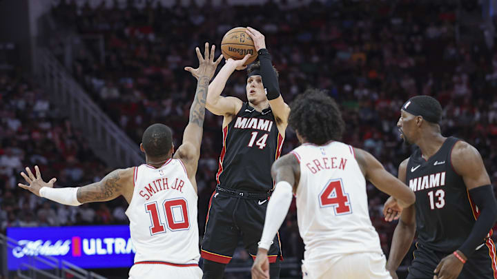 Apr 5, 2024; Houston, Texas, USA; Miami Heat guard Tyler Herro (14) shoots the ball during Friday's win against the Houston Rockets - Troy Taormina/USA Today Sports