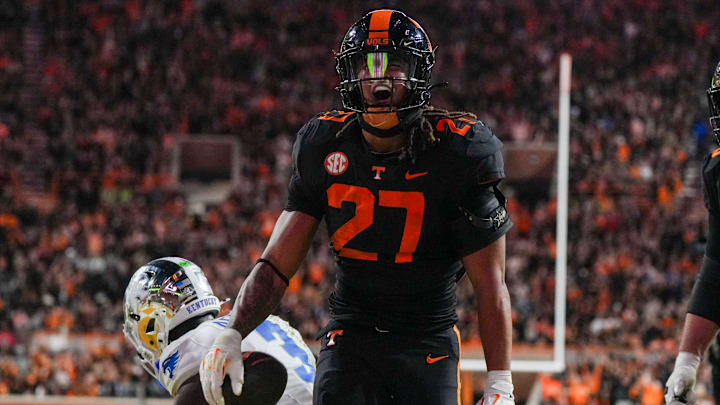Tennessee running back Peyton Lewis (27) celebrates after scoring a touchdown during a NCAA football game between Tennessee and Kentucky in Neyland Stadium on Saturday, Nov. 2, 2024. Tennessee running back Peyton Lewis (27) celebrates after scoring a touchdown during a NCAA football game between Tennessee and Kentucky in Neyland Stadium on Saturday, Nov. 2, 2024.
