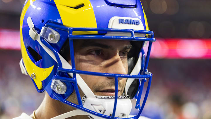 Dec 7, 2025; Glendale, Arizona, USA; Los Angeles Rams quarterback Jimmy Garoppolo (11) against the Arizona Cardinals at State Farm Stadium. Mandatory Credit: Mark J. Rebilas-Imagn Images