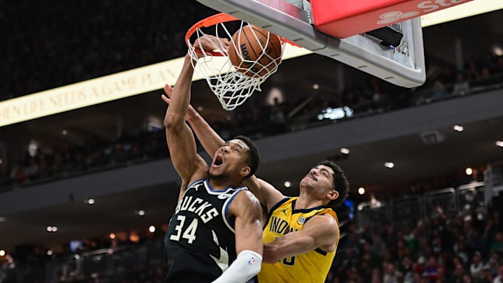 Apr 27, 2025; Milwaukee, Wisconsin, USA; Milwaukee Bucks forward Giannis Antetokounmpo (34) dunks the ball against Indiana Pacers guard Ben Sheppard (26) in the third quarter during game four of first round for the 2024 NBA Playoffs at Fiserv Forum. Mandatory Credit: Benny Sieu-Imagn Images Apr 27, 2025; Milwaukee, Wisconsin, USA; Milwaukee Bucks forward Giannis Antetokounmpo (34) dunks the ball against Indiana Pacers guard Ben Sheppard (26) in the third quarter during game four of first round for the 2024 NBA Playoffs at Fiserv Forum. Mandatory Credit: Benny Sieu-Imagn Images