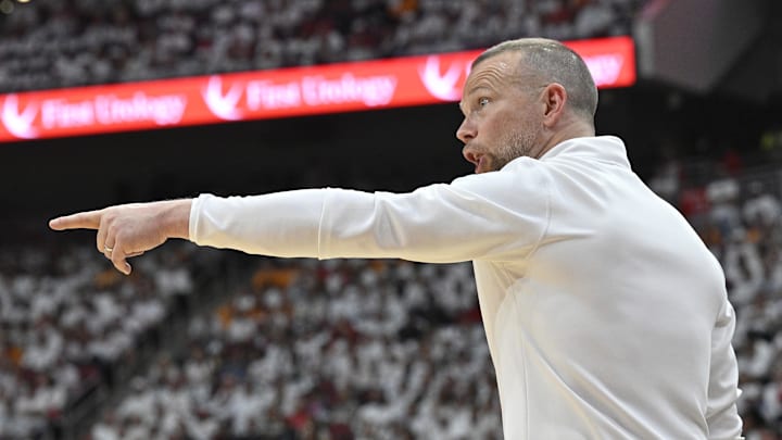 Nov 9, 2024; Louisville, Kentucky, USA;  Louisville Cardinals head coach Pat Kelsey calls out instructions during the first half against the Tennessee Volunteers at KFC Yum! Center. Mandatory Credit: Jamie Rhodes-Imagn Images
