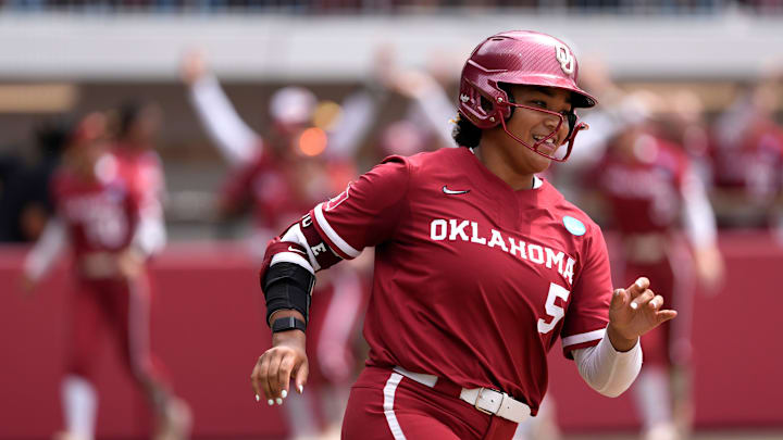 Oklahoma infielder Ella Parker (5) smiles after hitting a home run in the fifth inning of Game 2 of an NCAA super regional between the University of Oklahoma (OU) and the Alabama Crimson Tide at Love's Field in Norman, Saturday, May 24, 2025. Oklahoma won 13-2 to advance to the Women's College World Series.