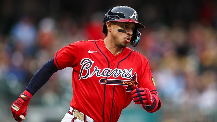 May 22, 2026; Atlanta, Georgia, USA; Atlanta Braves left fielder Mauricio Dubon (14) hits a double against the Washington Nationals in the first inning at Truist Park. Mandatory Credit: Brett Davis-Imagn Images
