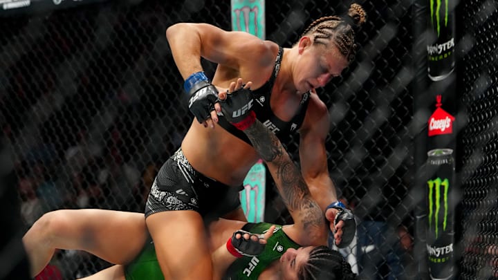 Kayla Harrison fought at UFC 307 after being in the hospital the week before.