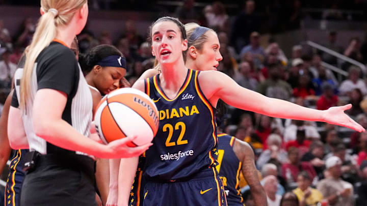 Indiana Fever guard Caitlin Clark (22) objects to a call by a referee, Thursday, May 16, 2024, during the Indiana Fever home opener game against the New York Liberty at Gainbridge Fieldhouse in Indianapolis.