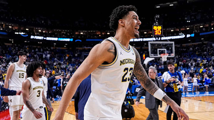 Michigan forward Yaxel Lendeborg (23) celebrates on court after 95-72 win over Saint Louis at the NCAA Tournament Second Round at KeyBank Center in Buffalo on Saturday, March 21, 2026. Michigan forward Yaxel Lendeborg (23) celebrates on court after 95-72 win over Saint Louis at the NCAA Tournament Second Round at KeyBank Center in Buffalo on Saturday, March 21, 2026.