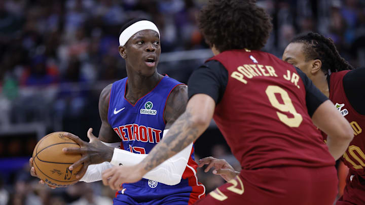 Mar 28, 2025; Detroit, Michigan, USA;  Detroit Pistons guard Dennis Schroder (17) dribbles defended by Cleveland Cavaliers guard Craig Porter Jr. (9) in the first half at Little Caesars Arena. Mandatory Credit: Rick Osentoski-Imagn Images