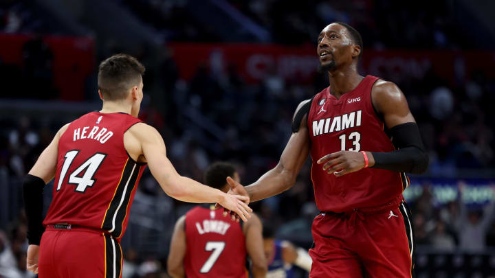 Jan 2, 2023; Los Angeles, California, USA;  Miami Heat center Bam Adebayo (13) shakes hand with teammate Tyler Herro - Kiyoshi Mio/USA TODAY Sports