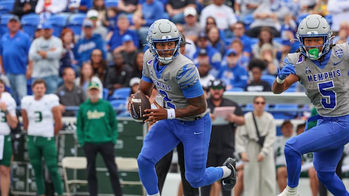 Memphis Tigers quarterback Brendon Lewis came up big Saturday as the Tigers overcame USF 34-31 on Saturday. Memphis Tigers quarterback Brendon Lewis came up big Saturday as the Tigers overcame USF 34-31 on Saturday.