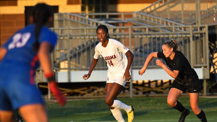 Alabama forward Gianna Paul (14) looks to make a shot against DePaul. The Alabama Crimson Tide soccer team opened the 2023 season against DePaul Thursday, Aug. 17, 2023.
