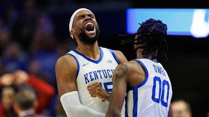 Jan 18, 2025; Lexington, Kentucky, USA; Kentucky Wildcats forward Ansley Almonor (15) celebrates with guard Otega Oweh (00) during the second half against the Alabama Crimson Tide at Rupp Arena at Central Bank Center. Mandatory Credit: Jordan Prather-Imagn Images