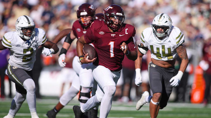 Virginia Tech Hokies quarterback Kyron Drones (1) runs for a touchdown against Georgia Tech 