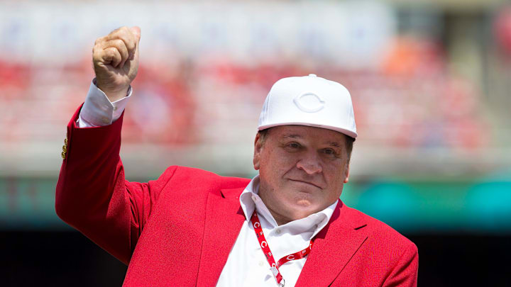 Cincinnati Reds hall of famer Pete Rose gives a thumbs up to the fans as he is introduced during a pregame ceremony for the unveiling of Pete Rose's bronze statue being installed outside the stadium before the MLB National League game between the Cincinnati Reds and the Los Angeles Dodgers at Great American Ball Park in downtown Cincinnati on Saturday, June 17, 2017.