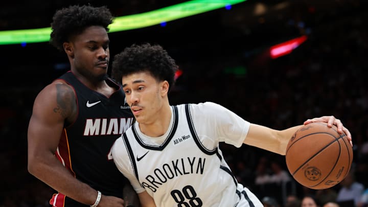 Mar 3, 2026; Miami, Florida, USA; Brooklyn Nets guard Nolan Traore (88) drives to the basket against Miami Heat guard Davion Mitchell (45) during the second quarter at Kaseya Center. Mandatory Credit: Sam Navarro-Imagn Images Mar 3, 2026; Miami, Florida, USA; Brooklyn Nets guard Nolan Traore (88) drives to the basket against Miami Heat guard Davion Mitchell (45) during the second quarter at Kaseya Center. Mandatory Credit: Sam Navarro-Imagn Images