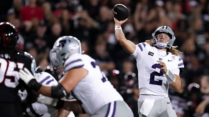 Sep 26, 2026; Cincinnati, Ohio, USA; Kansas State Wildcats quarterback Avery Johnson (2) throws a pass against the Cincinnati Bearcats in the second half at Nippert Stadium. Mandatory Credit: Aaron Doster-Imagn Images Sep 26, 2026; Cincinnati, Ohio, USA; Kansas State Wildcats quarterback Avery Johnson (2) throws a pass against the Cincinnati Bearcats in the second half at Nippert Stadium. Mandatory Credit: Aaron Doster-Imagn Images