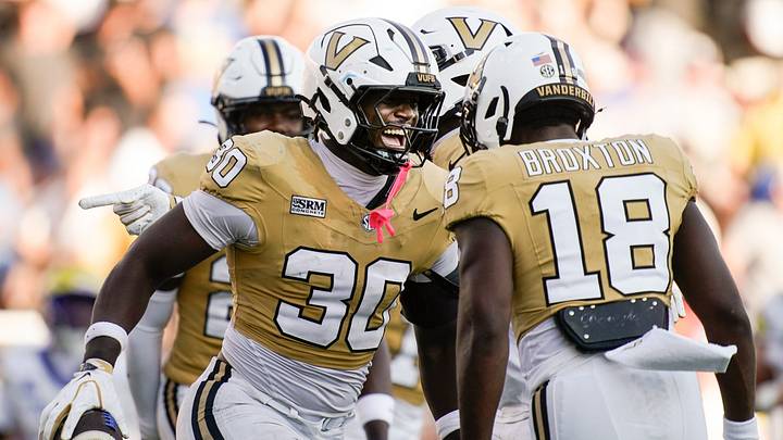 Vanderbilt linebacker Austin Howard (30) celebrates his touchdown off of a blocked punt against Delaware during the third quarter at FirstBank Stadium in Nashville, Tenn., Saturday, Sept. 12, 2026. Vanderbilt linebacker Austin Howard (30) celebrates his touchdown off of a blocked punt against Delaware during the third quarter at FirstBank Stadium in Nashville, Tenn., Saturday, Sept. 12, 2026.