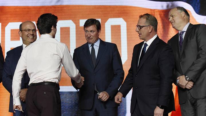 June 23, 2017; Chicago, IL, USA; Kailer Yamamoto greets Wayne Gretzky after being selected as the number twenty-two overall pick to the Edmonton Oilers in the first round of the 2017 NHL Draft at the United Center. Mandatory Credit: David Banks-Imagn Images
