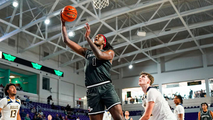 Dynamic Prep forward Jaden Toombs (1) shoots the ball during the second quarter of the City of Palms Classic signature series championship game against the Bullis Bulldogs at Suncoast Credit Union Arena in Fort Myers, Fla., on Sunday, Dec. 22, 2024.