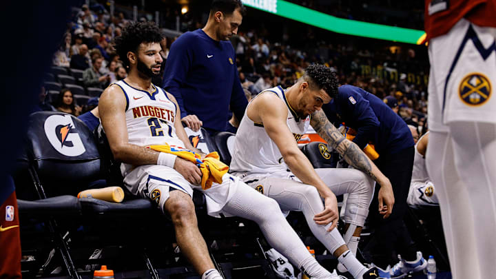 Dec 27, 2024; Denver, Colorado, USA; Denver Nuggets guard Jamal Murray (27) and forward Michael Porter Jr. (1) on the bench in the fourth quarter against the Cleveland Cavaliers at Ball Arena. Mandatory Credit: Isaiah J. Downing-Imagn Images