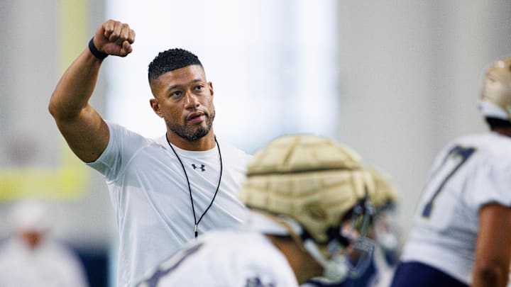 Notre Dame head coach Marcus Freeman warms up during a Notre Dame football practice at Irish Athletic Center on Thursday, Aug. 15, 2024, in South Bend. Notre Dame head coach Marcus Freeman warms up during a Notre Dame football practice at Irish Athletic Center on Thursday, Aug. 15, 2024, in South Bend.