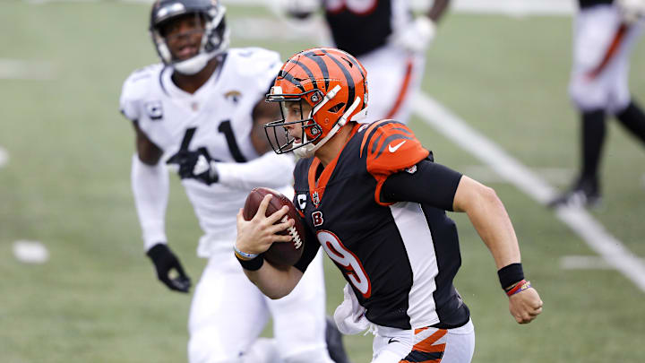 Oct 4, 2020; Cincinnati, Ohio, USA; Cincinnati Bengals quarterback Joe Burrow (9) runs the ball during the second half against the Jacksonville Jaguars at Paul Brown Stadium. Mandatory Credit: Joseph Maiorana-Imagn Images