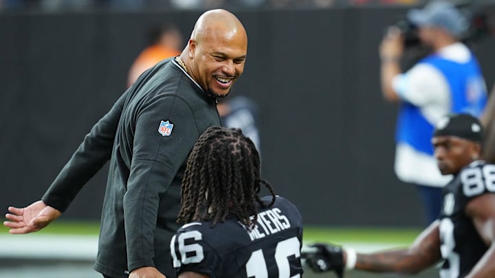 Oct 27, 2024; Paradise, Nevada, USA; Las Vegas Raiders head coach Antonio Pierce greets Las Vegas Raiders wide receiver Jakobi Meyers (16) before the start of a game against the Kansas City Chiefs at Allegiant Stadium. Mandatory Credit: Stephen R. Sylvanie-Imagn Images