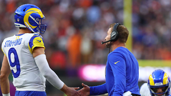 Feb 13, 2022; Inglewood, CA, USA; Los Angeles Rams quarterback Matthew Stafford (9) celebrates with head coach Sean McVay after a touchdown against the Cincinnati Bengals during the first quarter in Super Bowl LVI at SoFi Stadium. Mandatory Credit: Mark J. Rebilas-Imagn Images
