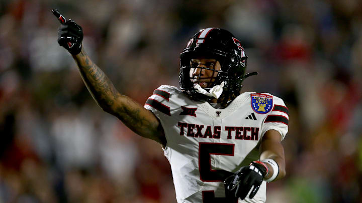 Dec 27, 2024; Memphis, TN, USA; Texas Tech Red Raiders wide receiver Caleb Douglas (5) reacts after a first down catch during the second quarter against the Arkansas Razorbacks at Simmons Bank Liberty Stadium. Mandatory Credit: Petre Thomas-Imagn Images